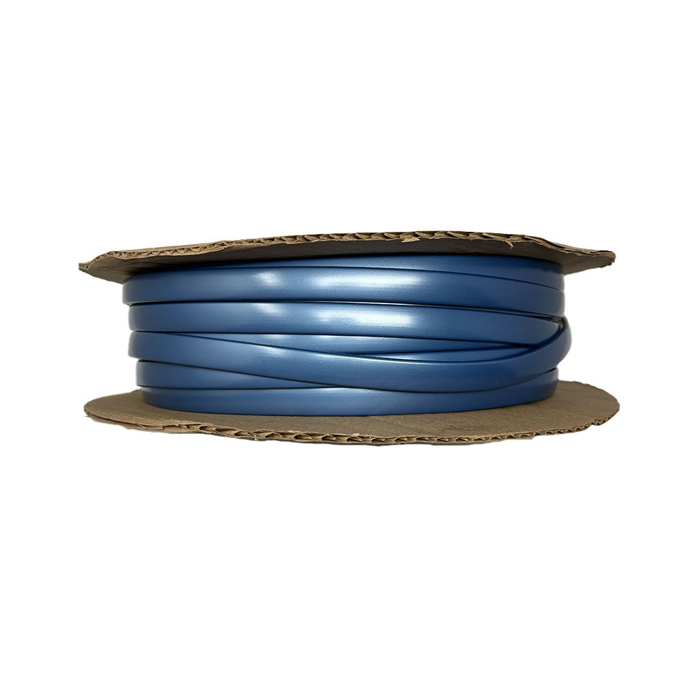 A coiled spool of the Airstream Premium Replacement Rub Rail for Travel Trailers is displayed between two round pieces of cardboard against a white background.