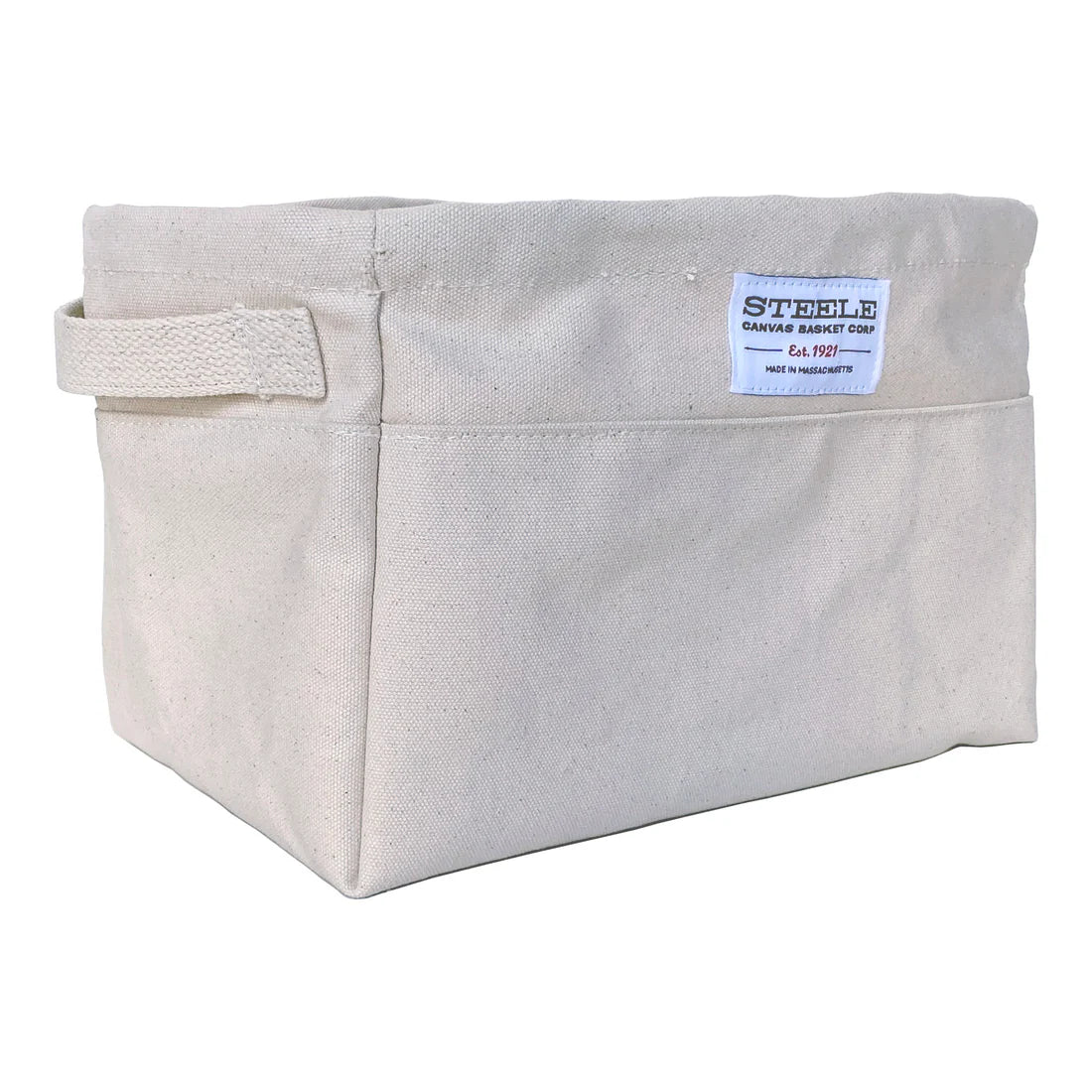A large, rectangular off-white canvas storage bin from the Large Canvas Storage Bins collection features a convenient side handle and a sewn label on the front reading “STEELE Canvas Basket Co. Est. 1921.” Shown empty against a plain background, this versatile bin is perfect for organizing trailers or keeping household essentials neatly stored.