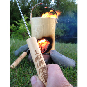 ONE LOG FIRE ROASTING STICK IN HAND