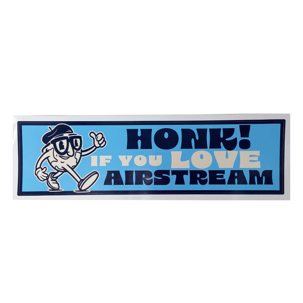 Show off your love for Airstream adventures with the Honk If You Love Airstream Bumper Sticker—a rectangular sticker featuring a cartoon peanut wearing glasses and a hat, plus playful HONK! IF YOU LOVE AIRSTREAM text in bold blue and yellow on a light blue background.