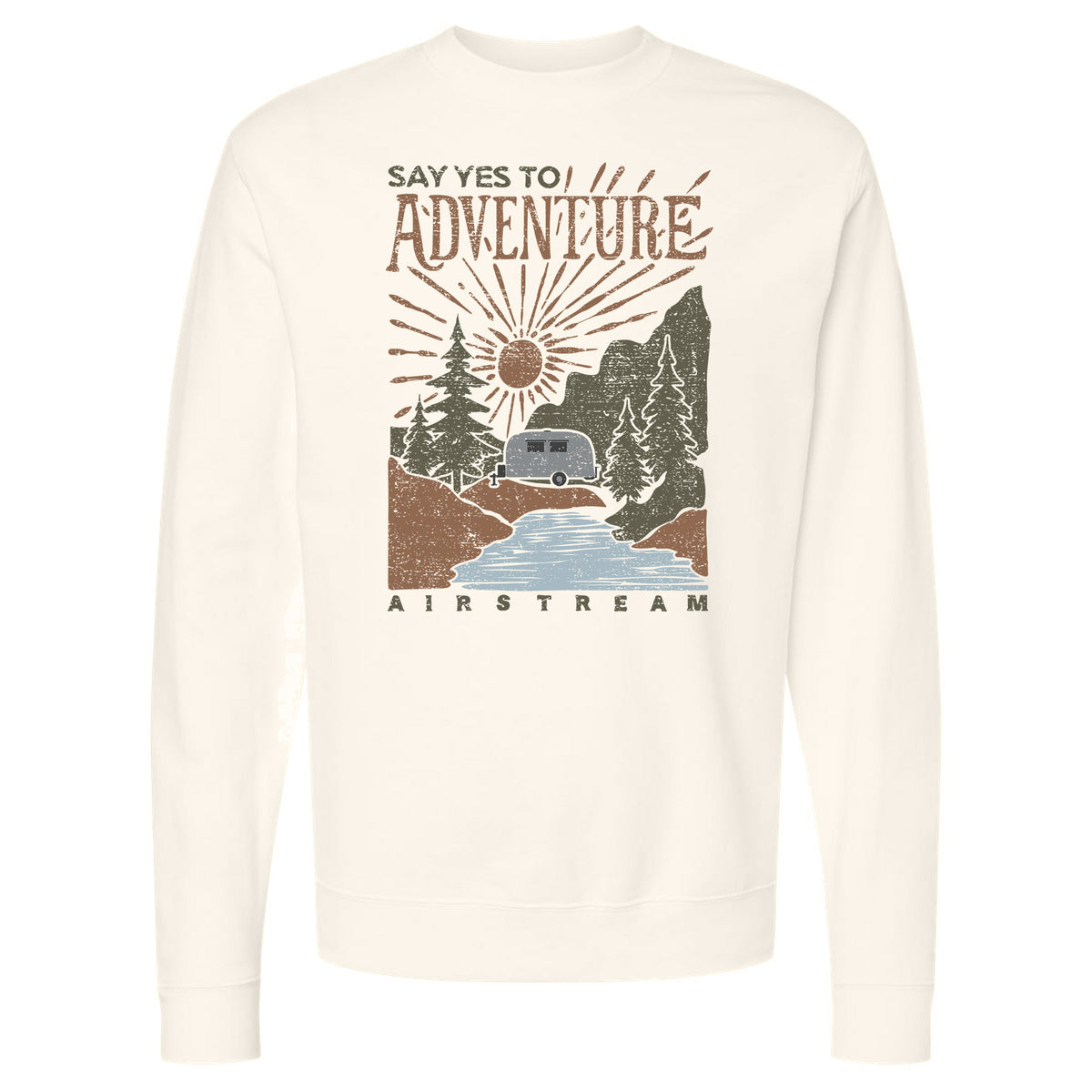 The Airstream Say Yes to Adventure Crew Sweatshirt features a white crew design with an earth-tone graphic of a camper van by a river, surrounded by pine trees, the sun, and rays. “Say Yes To Adventure” is printed above the scene and “Airstream” below, creating an outdoorsy theme that’s perfect for any adventure sweatshirt collection.