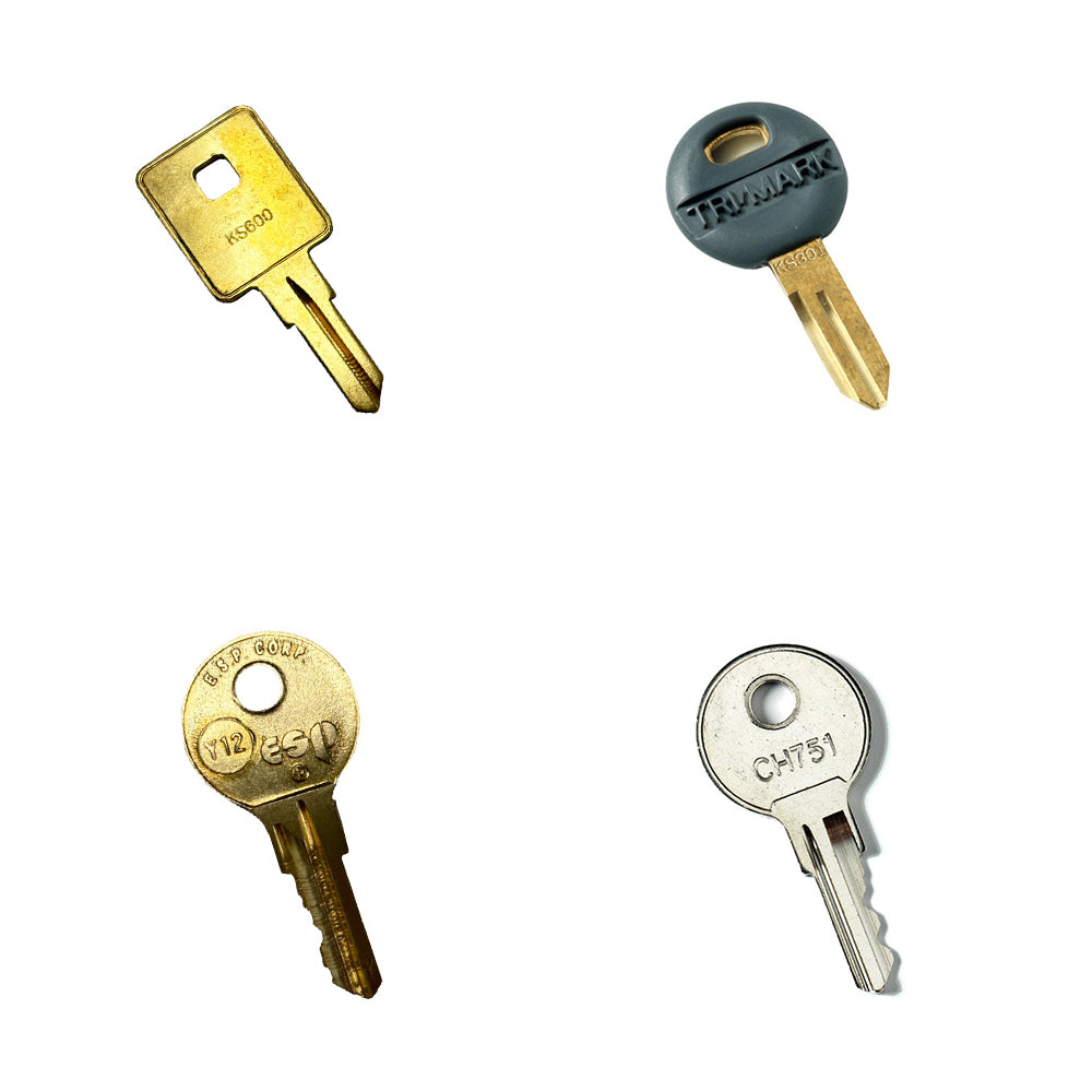 Four different keys from the Airstream Cut Key Bundle for Pan America Travel Trailers are arranged on a white background, each featuring unique shapes and designs—including varied heads and grooves—reminiscent of pre-cut trailer keys.
