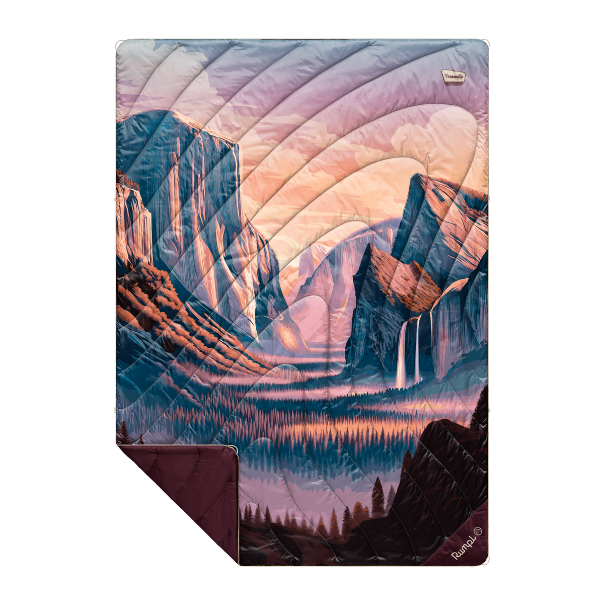 Introducing the NEW Rumpl National Park Blankets—this quilt showcases a vibrant landscape illustration of mountains, a waterfall, and a forest at sunset in hues of purple, pink, and blue. One corner is folded to reveal a solid maroon underside, capturing the spirit of iconic National Parks.