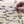 Hand interacting with a wooden map of national parks