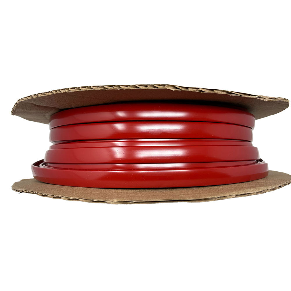 A spool of red flat tubing or sleeving, wound on a cardboard reel and shown against a white background, designed as the Airstream Premium Replacement Rub Rail for Travel Trailers.