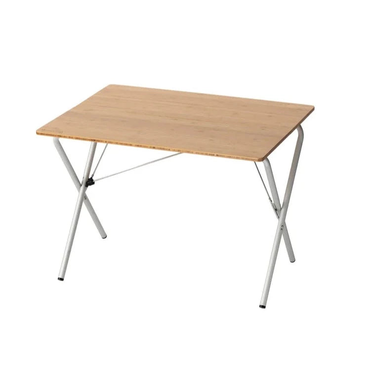 The Snow Peak Renewed Medium Single Action Table features a rectangular wooden top and silver metal legs, angled and crossed for stability. Shown against a white background, this portable folding table is ideal for both indoor and outdoor use.