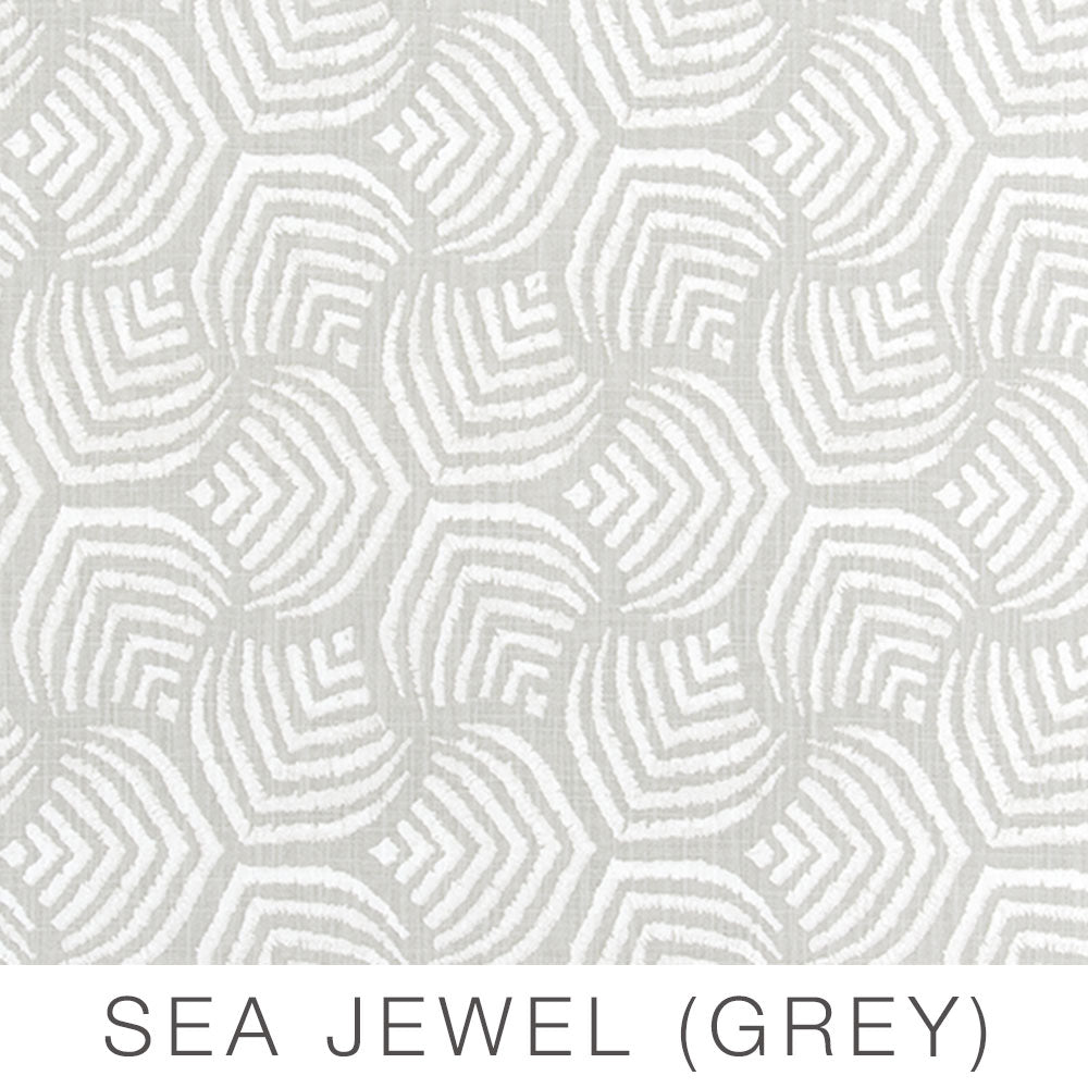 Abstract grey and white geometric pattern featuring repeating fan shapes, inspired by modern travel trailer decor. Text at the bottom reads “Airstream Printed Custom Curtains for Pottery Barn Travel Trailers (SEA JEWEL - GREY).”.