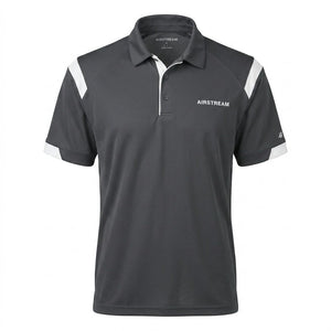 Introducing the Airstream Shoulder Stripe Polo in dark gray, featuring white accents on the shoulders and sleeves. This heritage-inspired polo offers a classic collar with three buttons, is crafted from sporty, breathable fabric for all-day comfort, and showcases “AIRSTREAM” printed on the left chest—bringing timeless Americana style to your wardrobe.