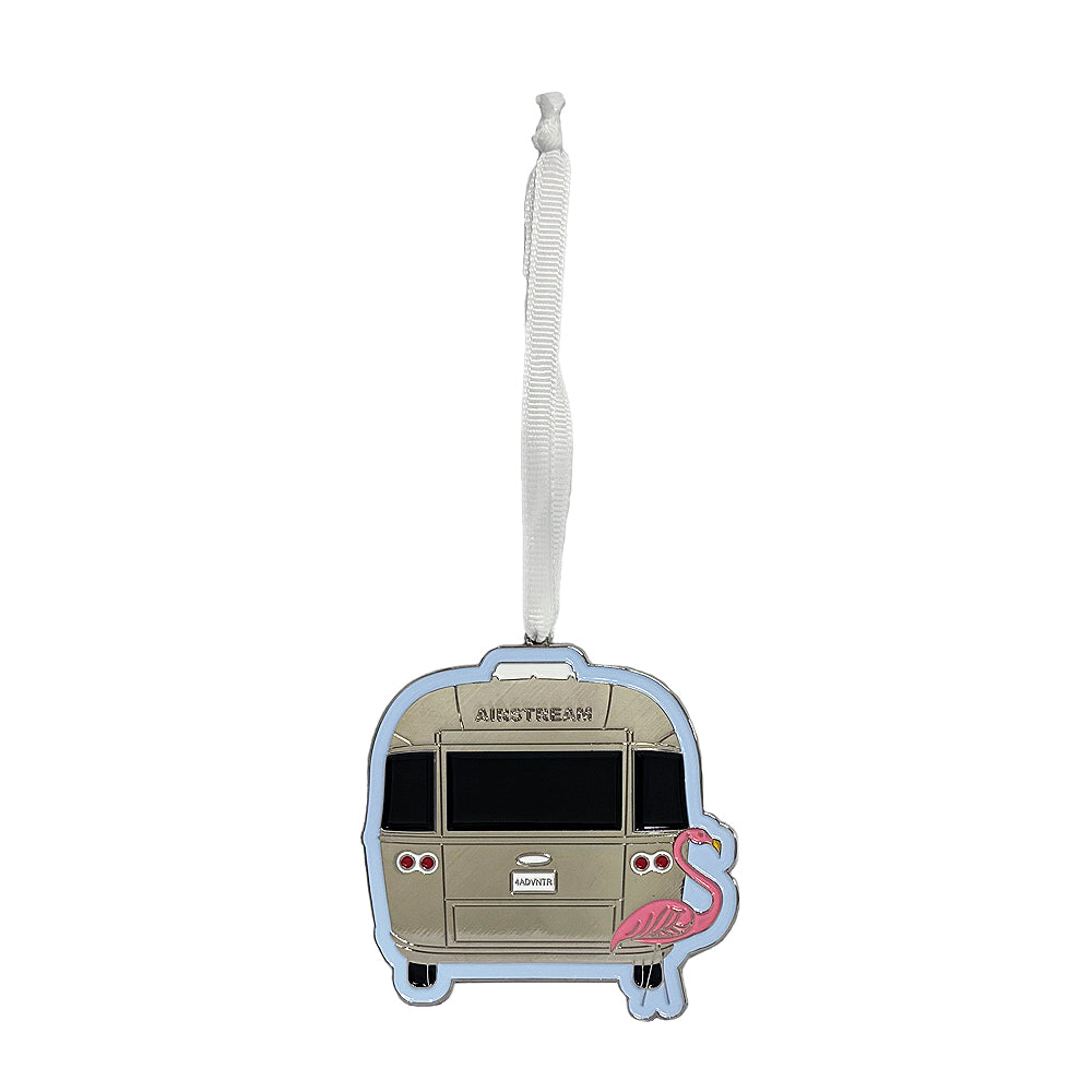 Celebrate the silver season with the Airstream Flamingo Travel Trailer Flat Ornament—a charming accessory shaped like an Airstream trailer, featuring a pink flamingo detail on the side and a white strap for hanging. This delightful ornament makes a perfect gift for travel lovers.