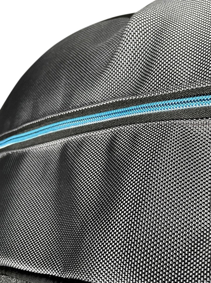 Close-up of the Airstream Travel Pet Bed’s textured gray fabric bag with a blue zipper, featuring detailed stitching and surface patterns—ideal as a stylish pet accessory or for conveniently carrying your portable pet bed wherever you go.