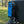 Airstream travel trailer with a blue storage bag attached to the back