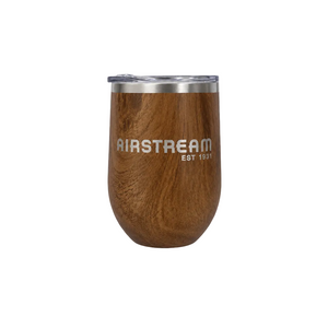 Airstream Woodgrain Wine Tumbler featuring a woodgrain finish, stemless design, and a clear lid.