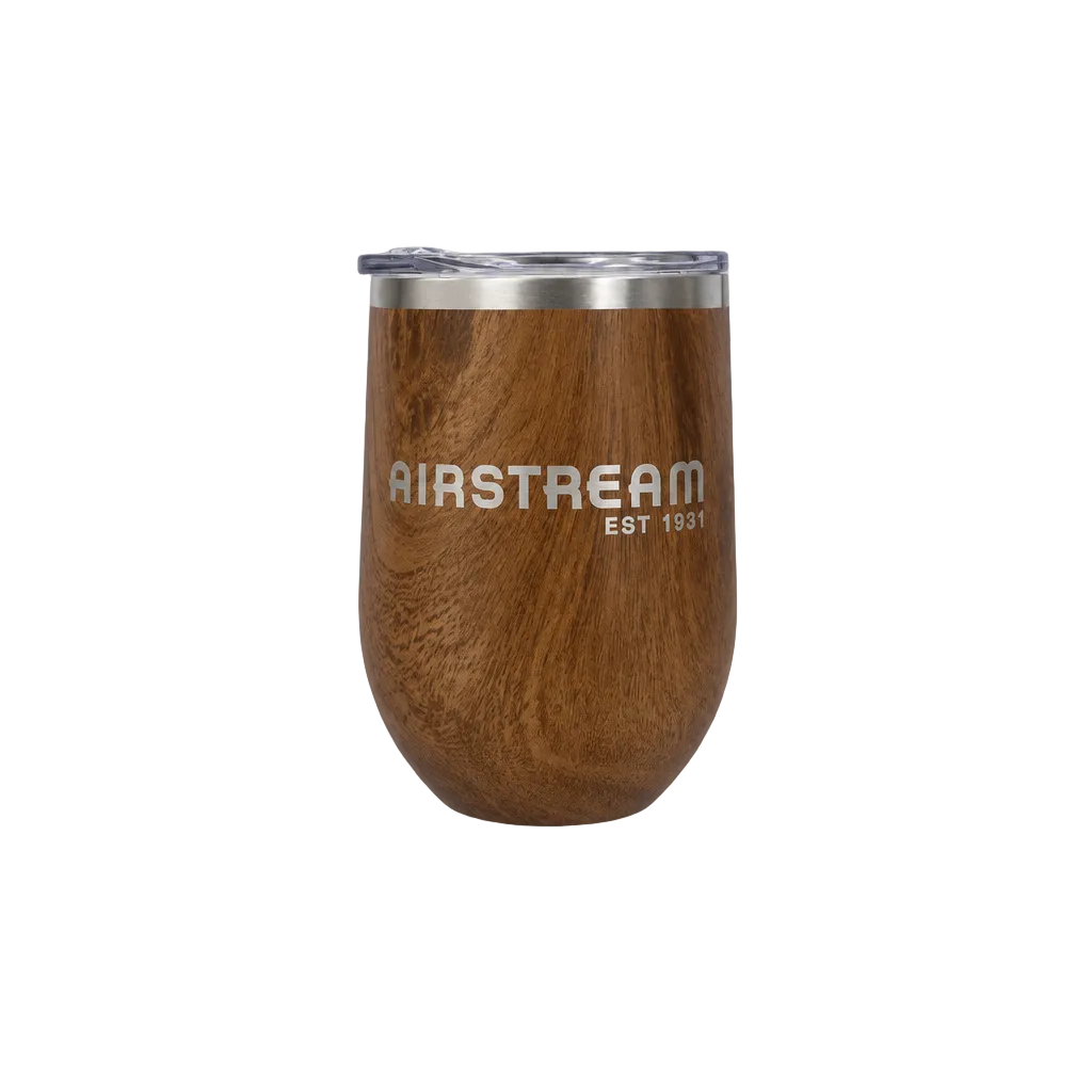 Airstream Woodgrain Wine Tumbler featuring a woodgrain finish, stemless design, and a clear lid.