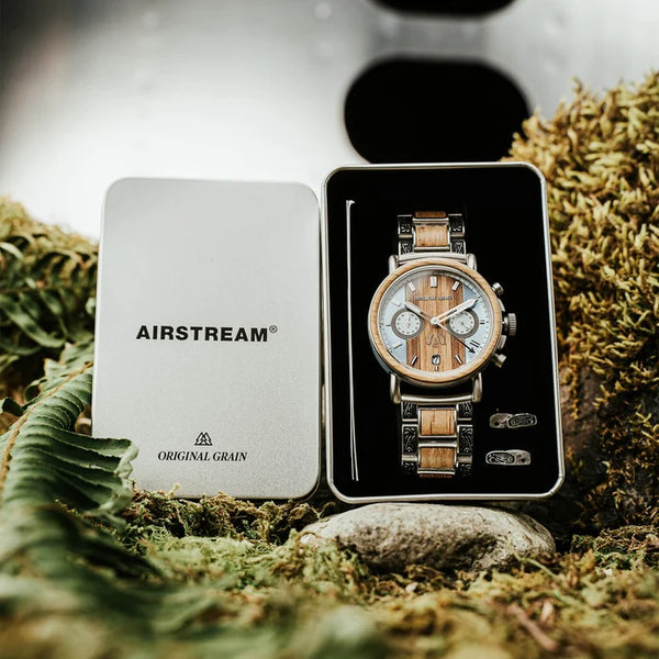 Wooden watch in a 'Airstream' branded box on a natural background