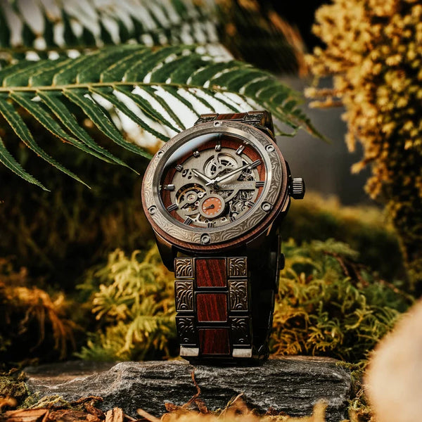 Decorative watch with intricate design on a natural background