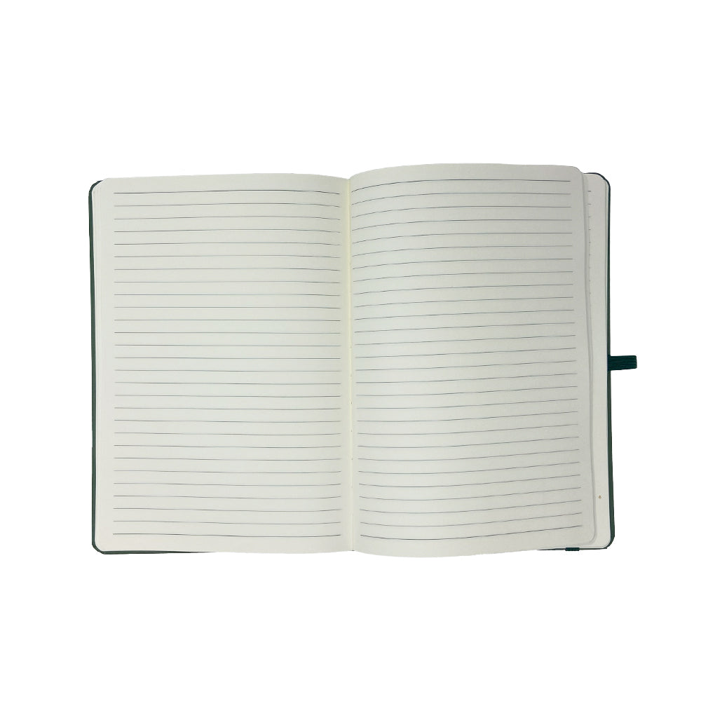 The Airstream Mountains Distressed Journal is displayed open from above, revealing its lined pages against a plain white background. The pages appear blank with evenly spaced horizontal lines.