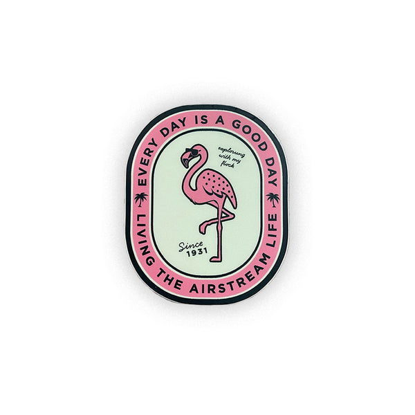 Sticker with flamingo design and text on a white background