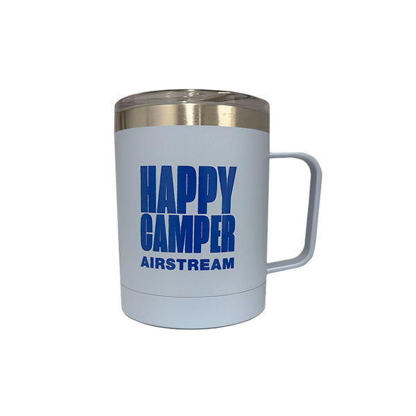 A blue travel mug that says Happy Camper with Airstream's logo