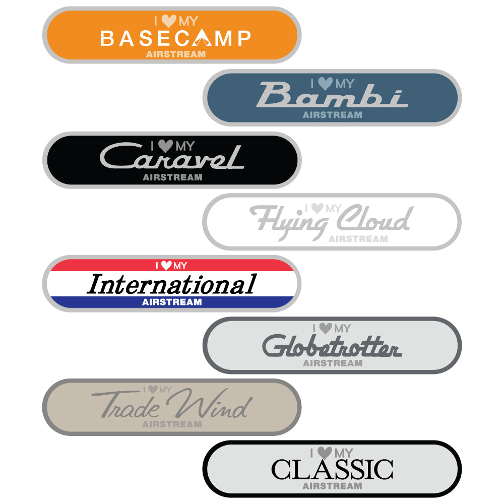 The “I Love My Airstream Bumper Stickers” set includes nine oval stickers, each weather-resistant and featuring a vibrant design with a unique font for popular models: Basecamp, Bambi, Caravel, Flying Cloud, International, Globetrotter, Trade Wind, and Classic—ideal as travel trailer or bumper stickers.