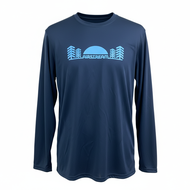 The Airstream Moisture Wicking Long Sleeve T-Shirt is a navy blue performance tee featuring a light blue graphic of trees, a sun, and the word “AIRSTREAM” on the chest—ideal for any Airstream enthusiast who values breathable comfort and adventure-ready style.