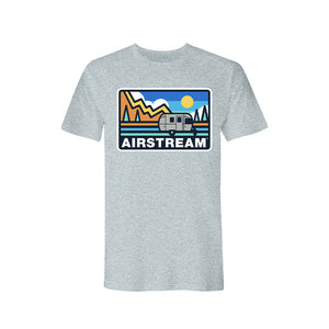 A gray unisex t-shirt with an abstract Airstream and mountain design. The design features the Airstream logo and an Airstream Travel Trailer