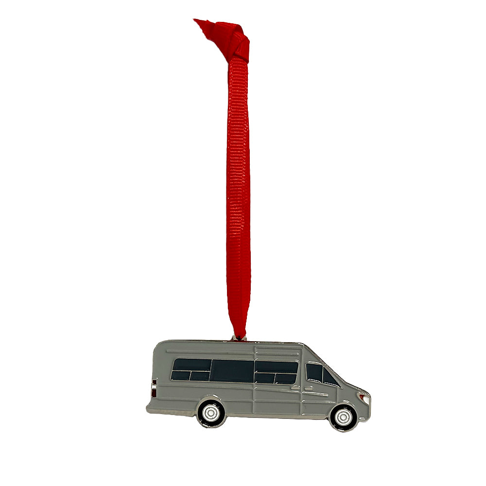 The Touring Coach Flat Ornament, shaped like a gray van with black windows, hangs from a red ribbon against a white background—making it a charming addition to your holiday décor.