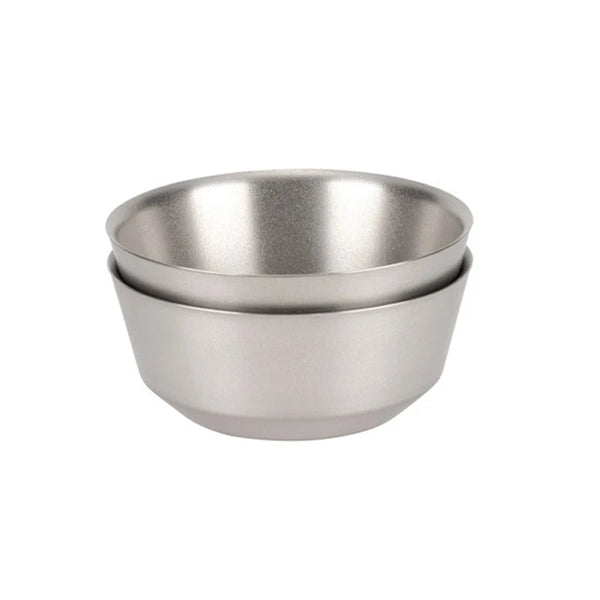 Two stainless steel bowls stacked on a white background